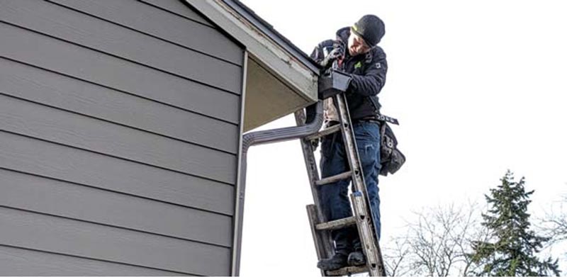 Replacing Downspouts To Improve Water Flow